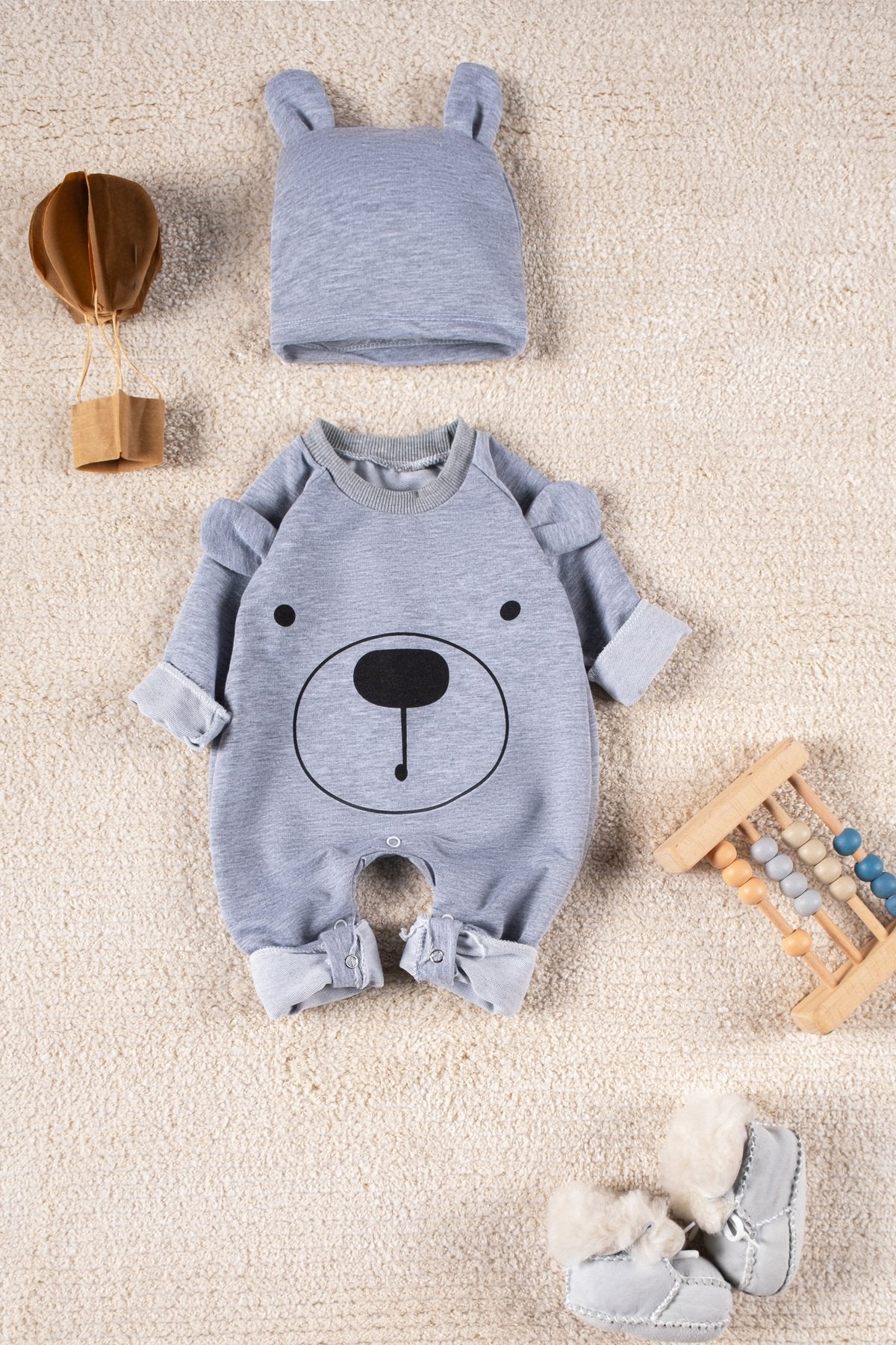 Gülen Yüz Desenli Şapkalı Bebek Tulum