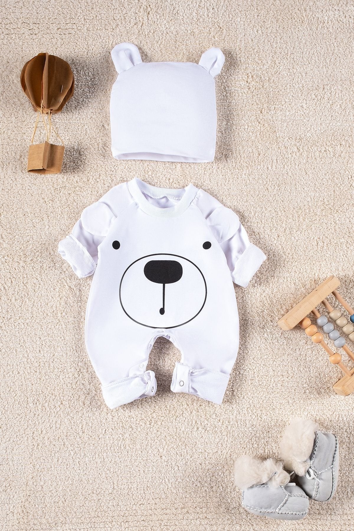 Gülen Yüz Desenli Şapkalı Bebek Tulum